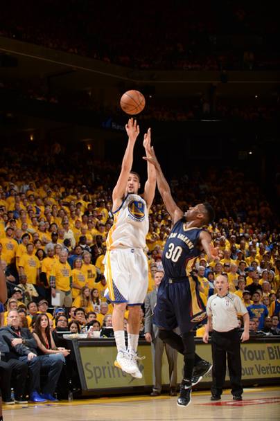 Klay Thompson, Golden State, in shot elude Norris Cole. (Getty Images)